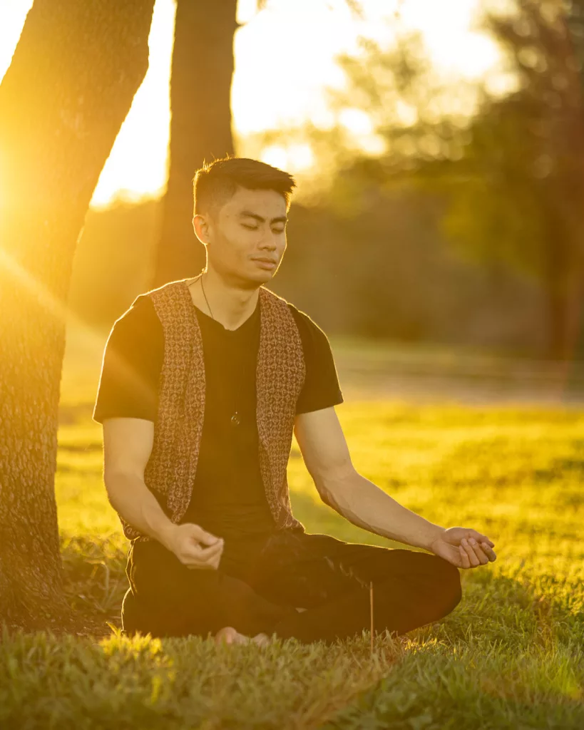 Professional dating profile photographer photo of client meditating